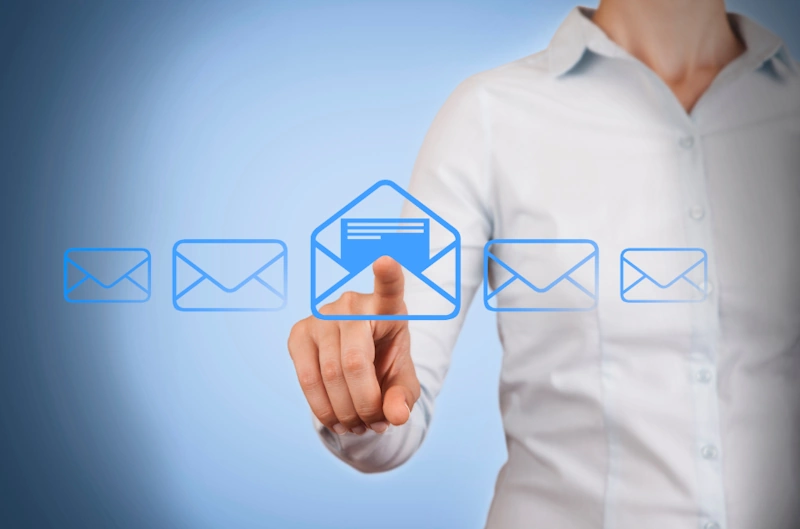 a person touching a touch screen for email marketing