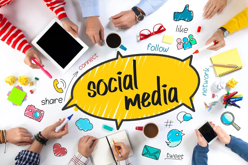 A table with social media illustrating the advantage of partnering with a digital marketing company