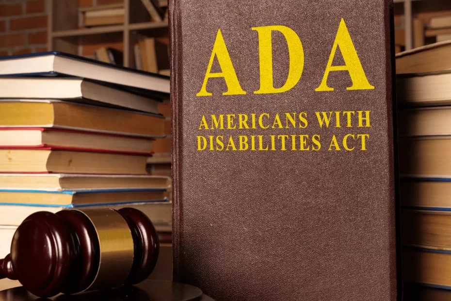 ADA Americans with Disabilities Act law book with a gavel and book stacks, illustrating the legal question: Do websites have to be ADA compliant?